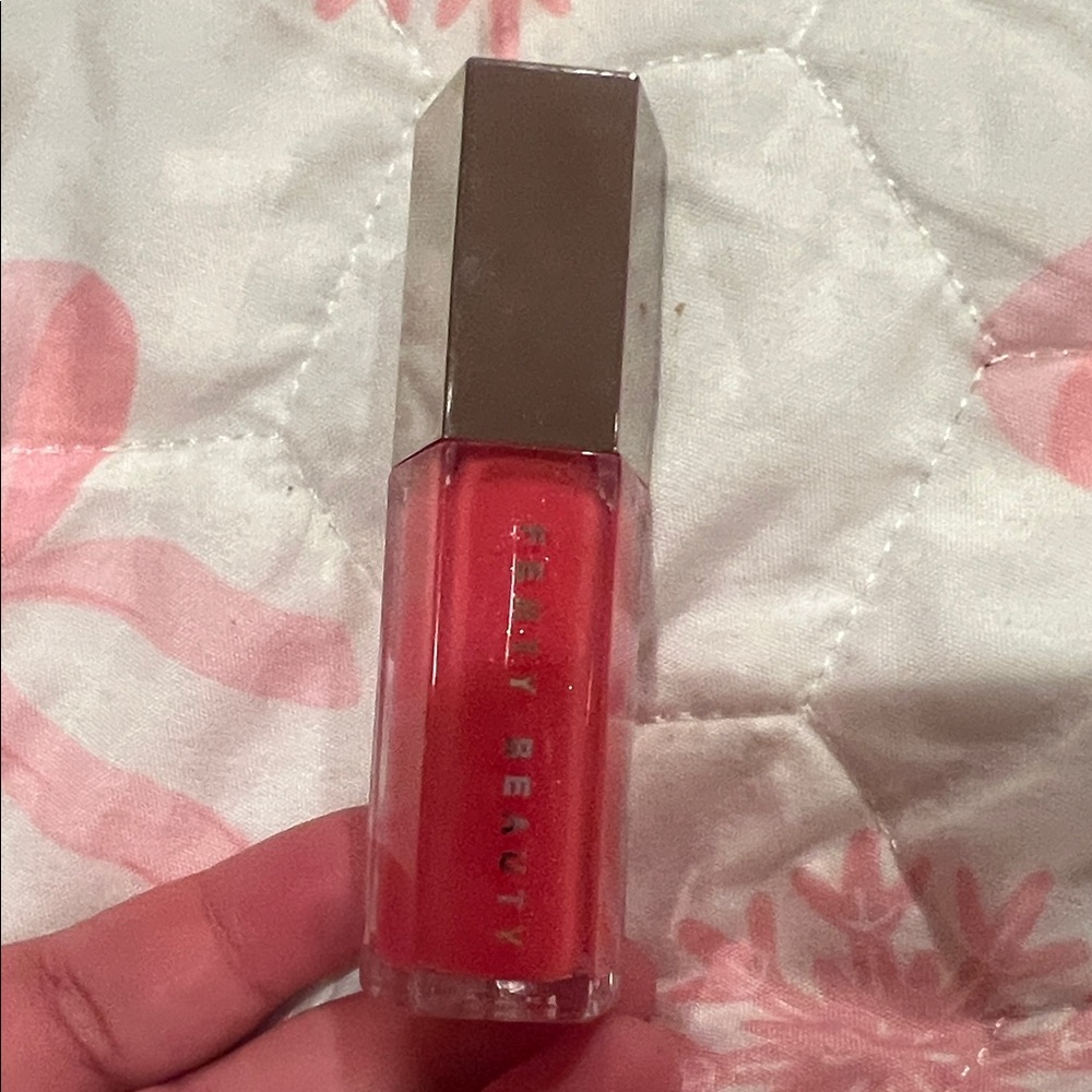 Fenty Beauty Lip Gloss in Bright Coral Red